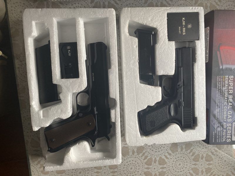 1911 y GLOCK 23 KJWORKS