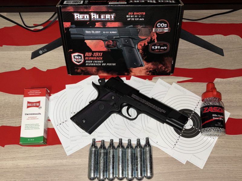 Pack completo Pistola CO₂ Red Alert RD-1911 Blowback + CO₂ + BBs + Ballistol (nuevo)