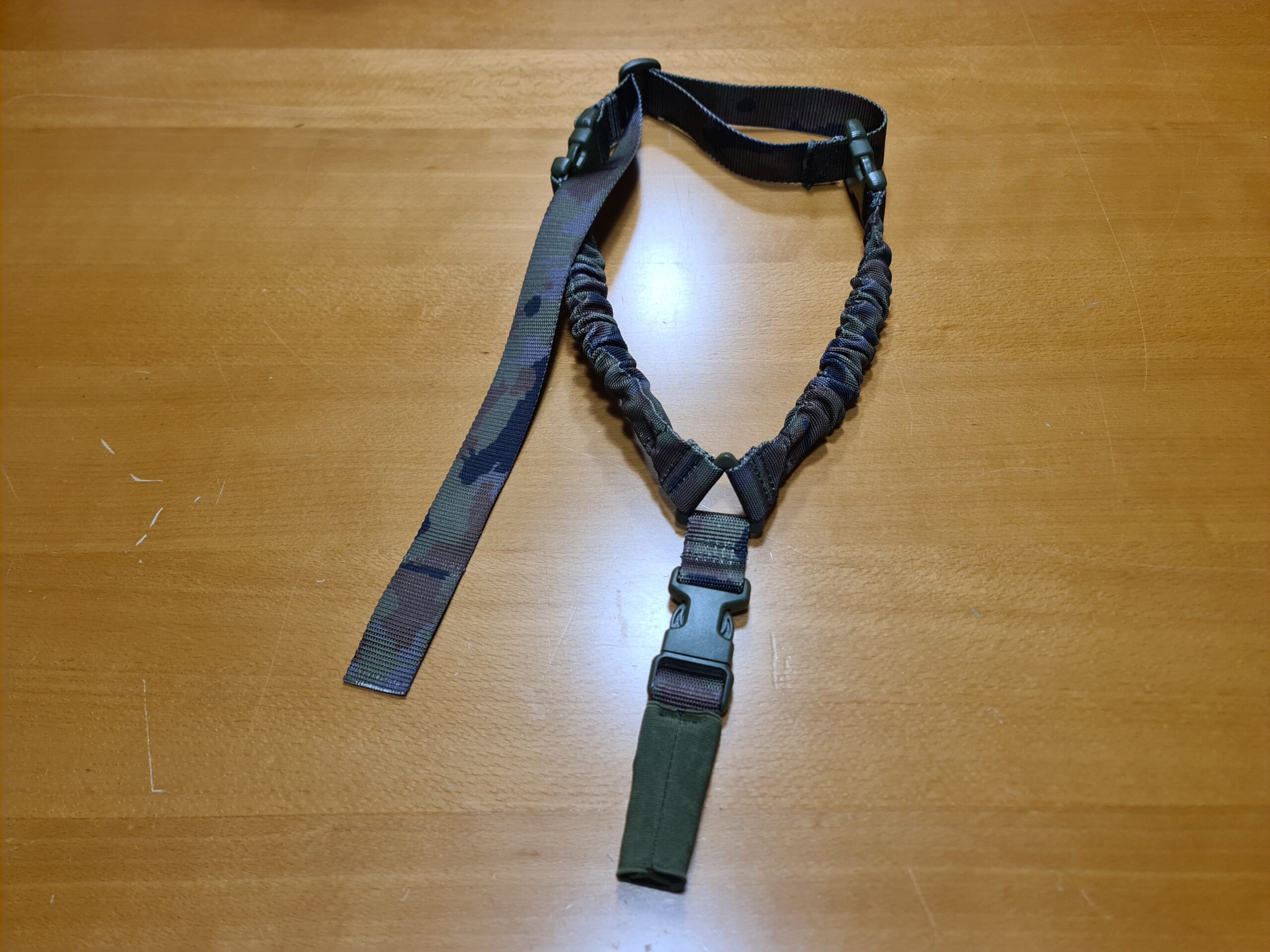 Sujecion de arma Boscoso Español