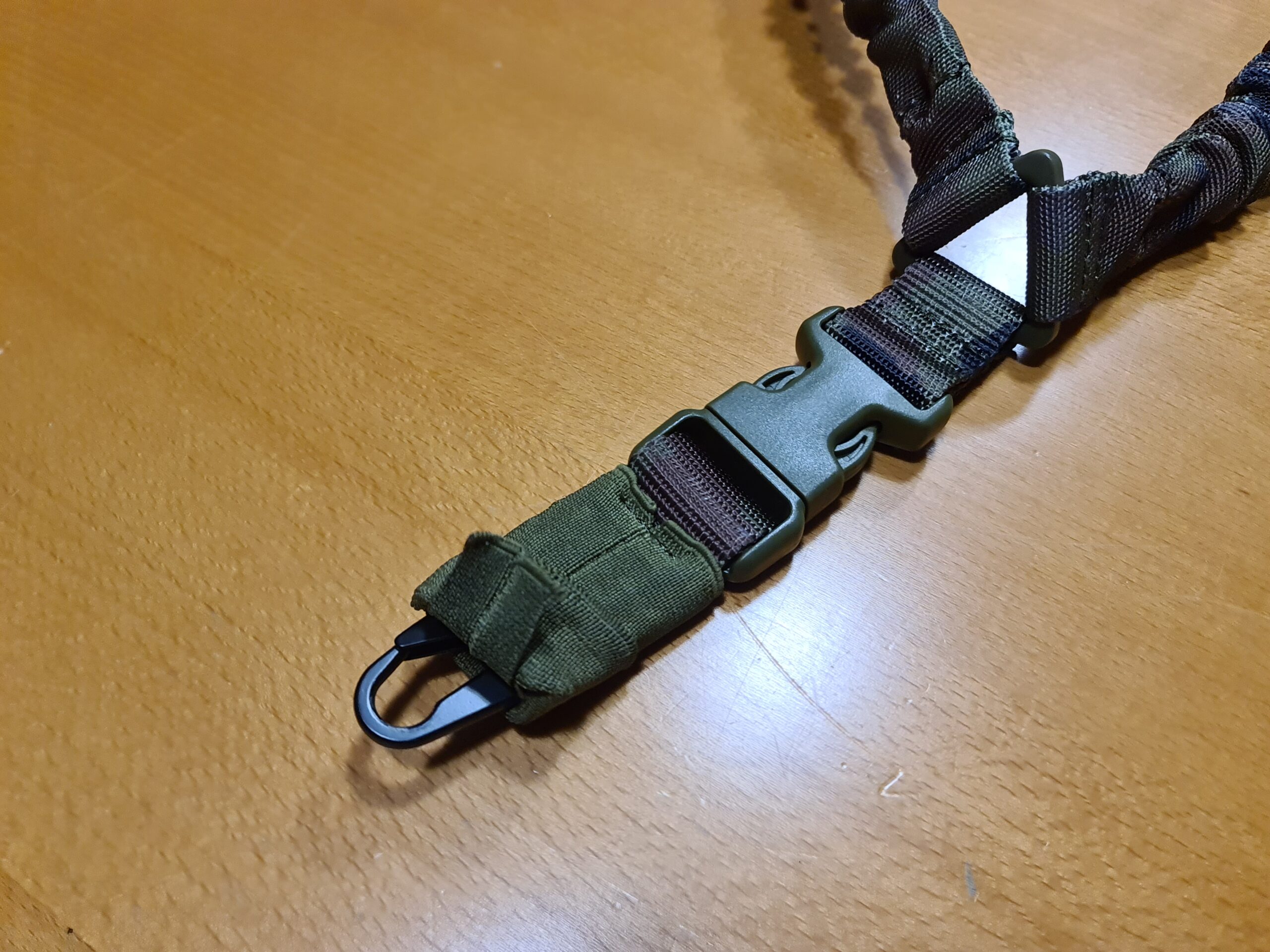 Sujecion de arma Boscoso Español